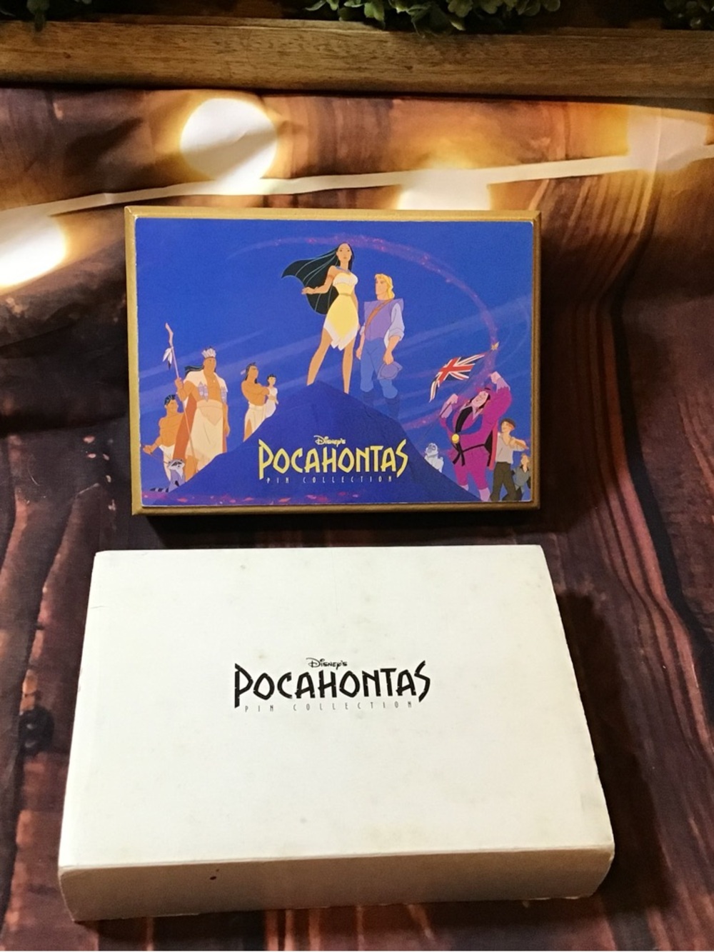 Vintage Disney’s Pocahontas pin collection in a wooden box